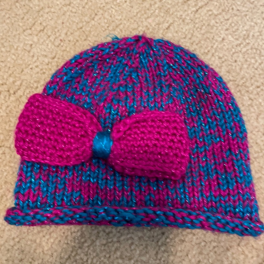 Handmade pink and blue winter hat for a little girl